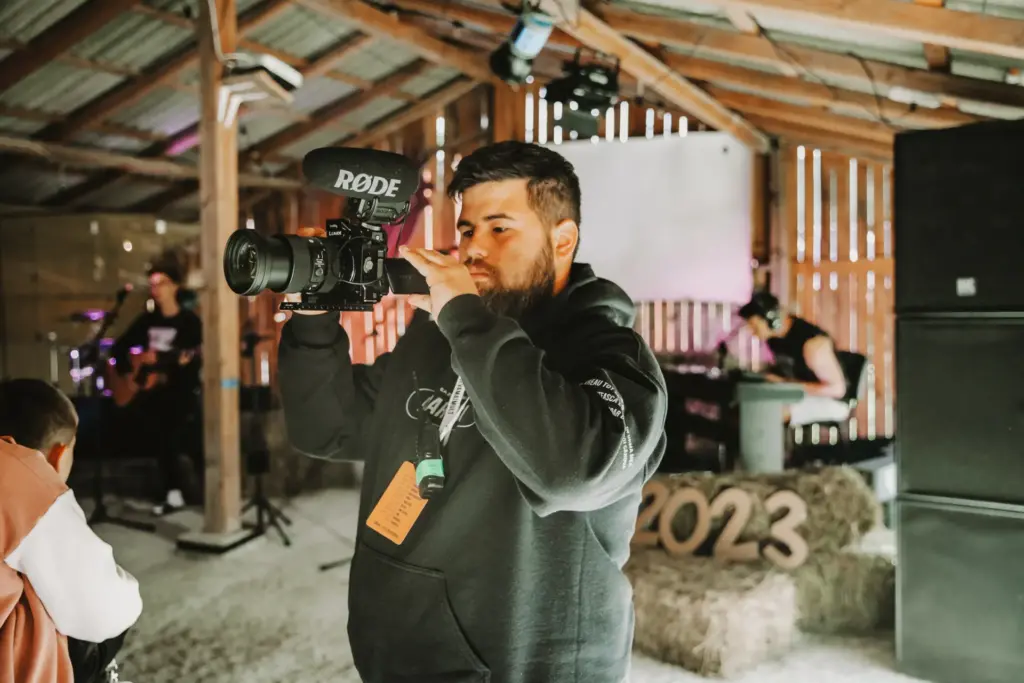 Man who volunteers in TUNI camp video team